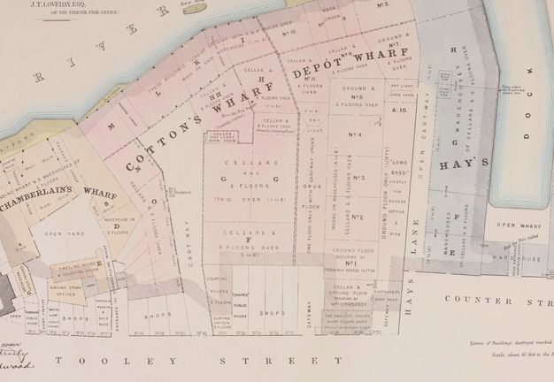Map. An area hemmed by the Thames River above and Tooley Street below has four colour-coded areas. To our left, the “Chamberlain’s Wharf” is coloured yellow. Next, “Cotton’s Wharf” and “Depot Wharf” are both pink. The narrowest, labelled “Hay’s”, is blue.